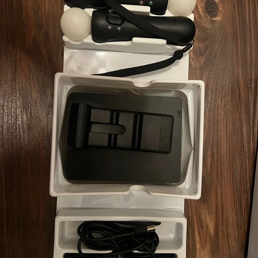 Used ps4 VR used only a couple of times comes with stand and 2 games